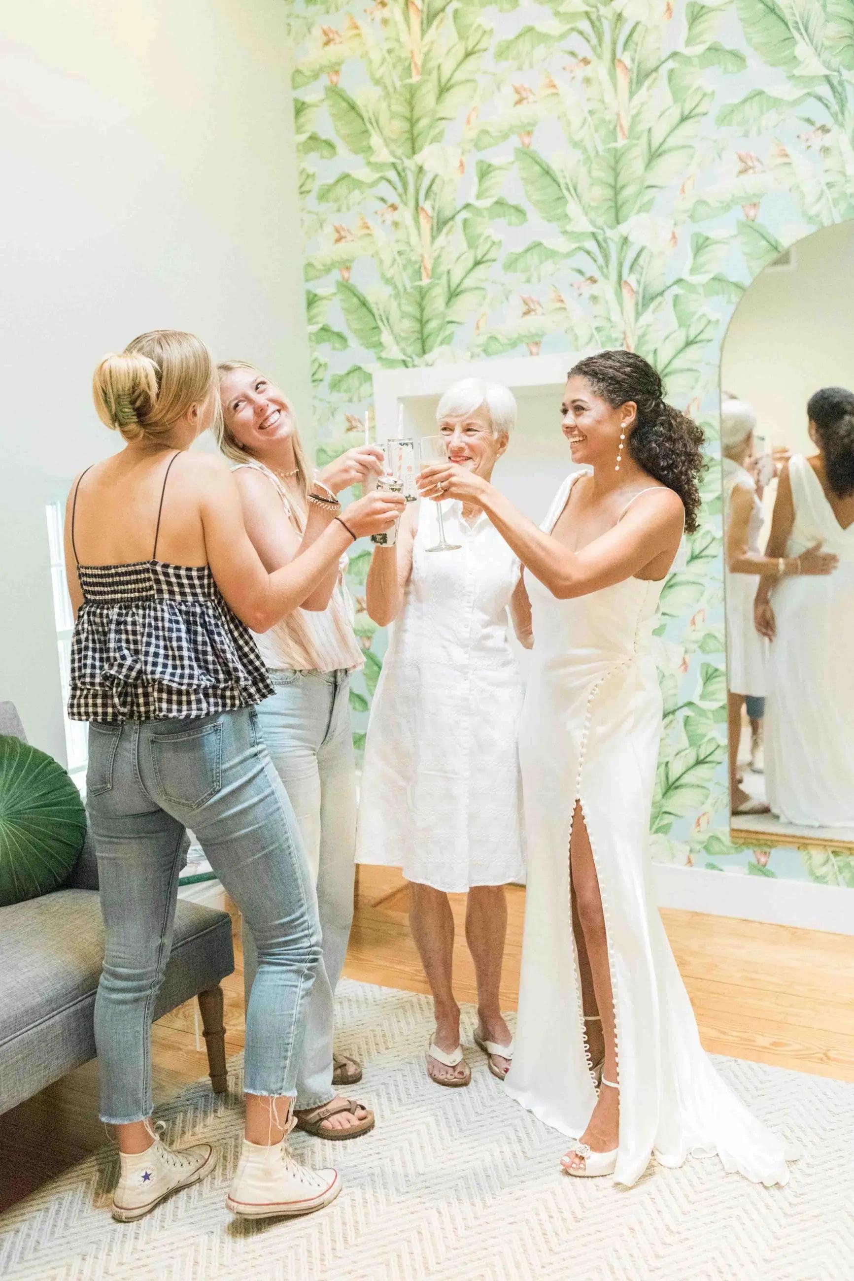 Bridal party cheers at a Palm Suite appointment