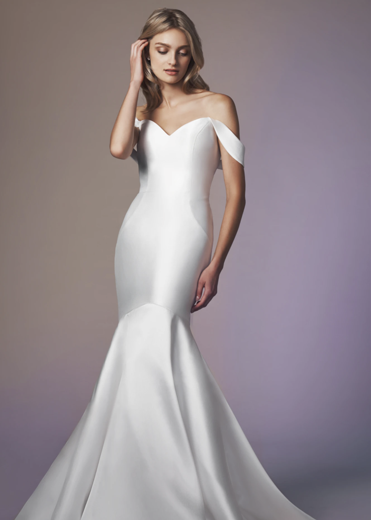 bride wearing off the shoulder wedding dress