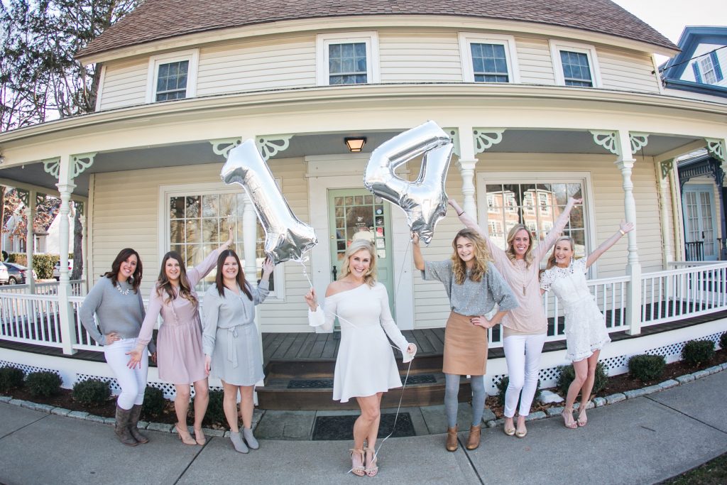 The White Dress by the shore celebrates 14 years of business. Desktop Image