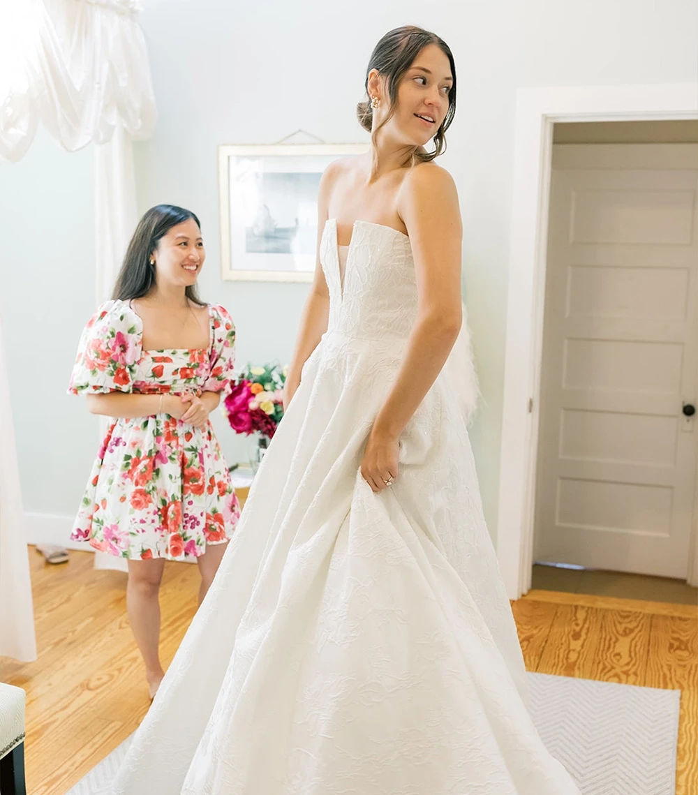 Model wearing a bridal white gown