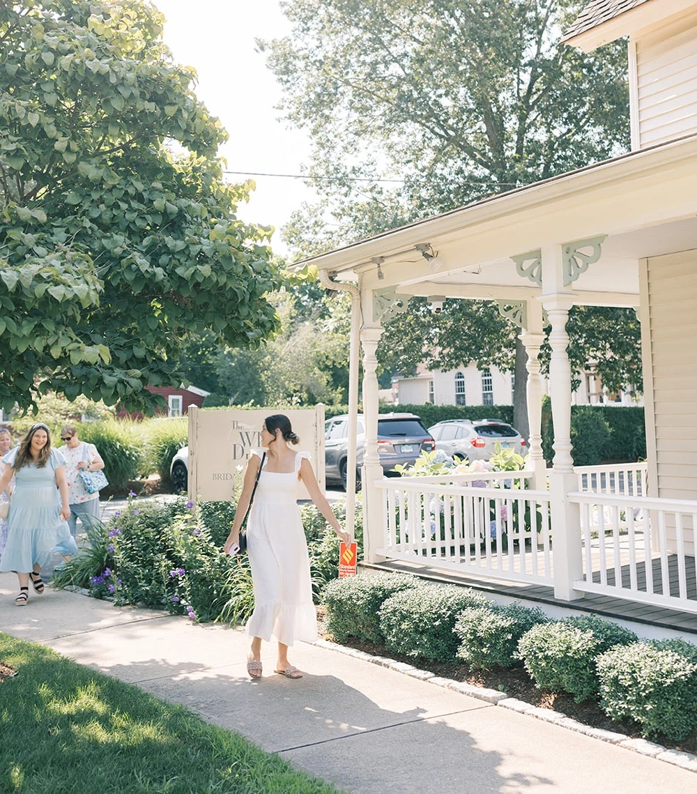 Model wearing a bridal white gown
