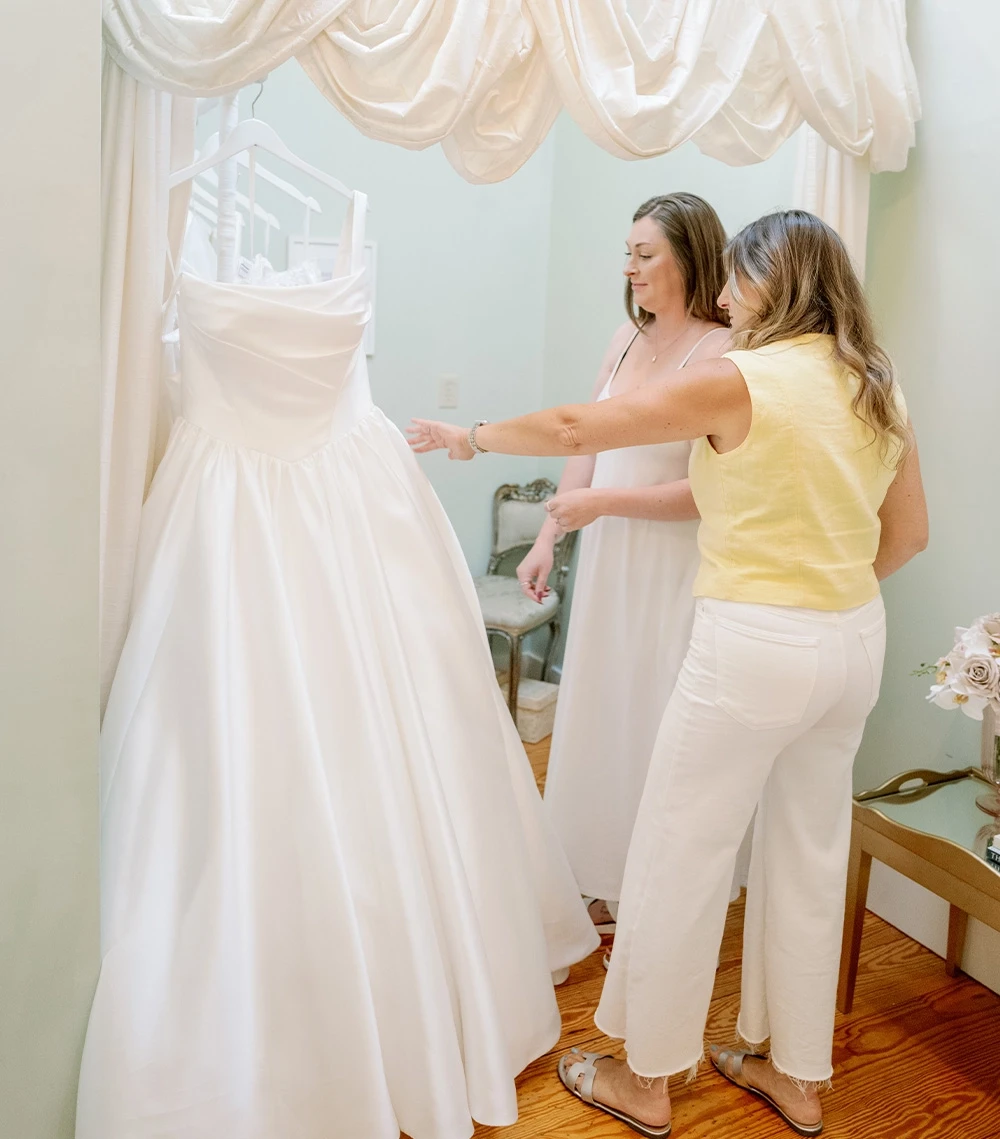 Model wearing a bridal white gown