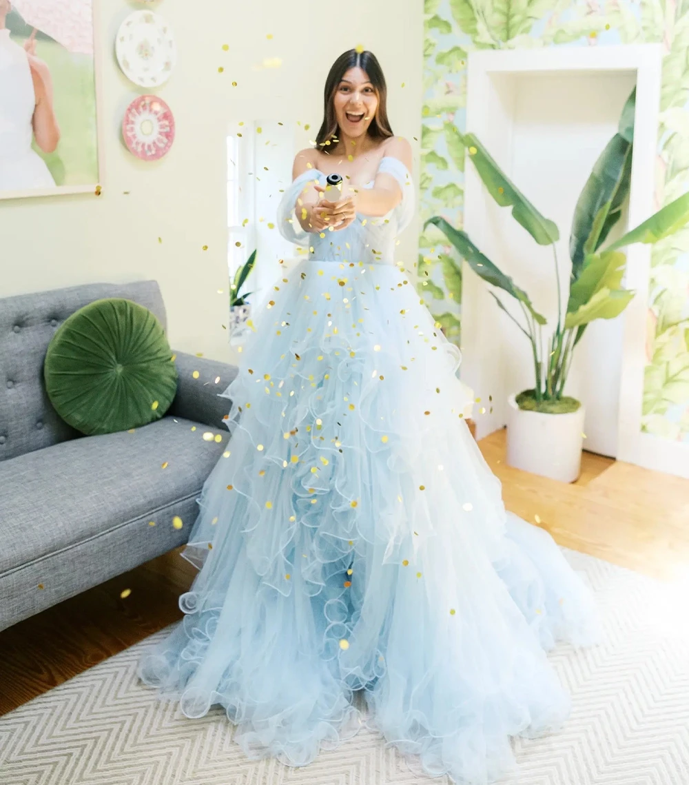 Model wearing a bridal white gown