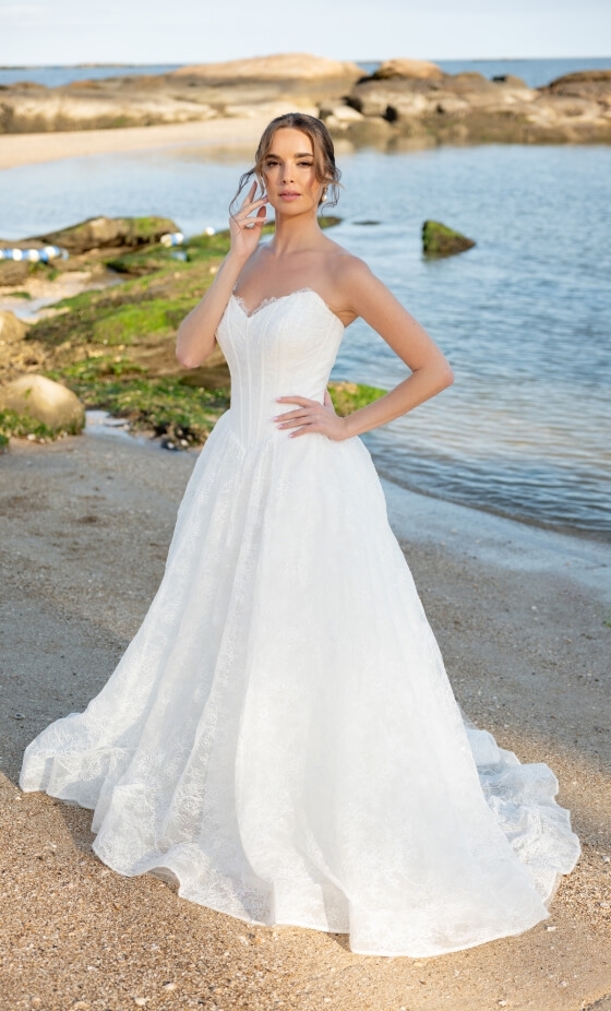 Model wearing a white dress