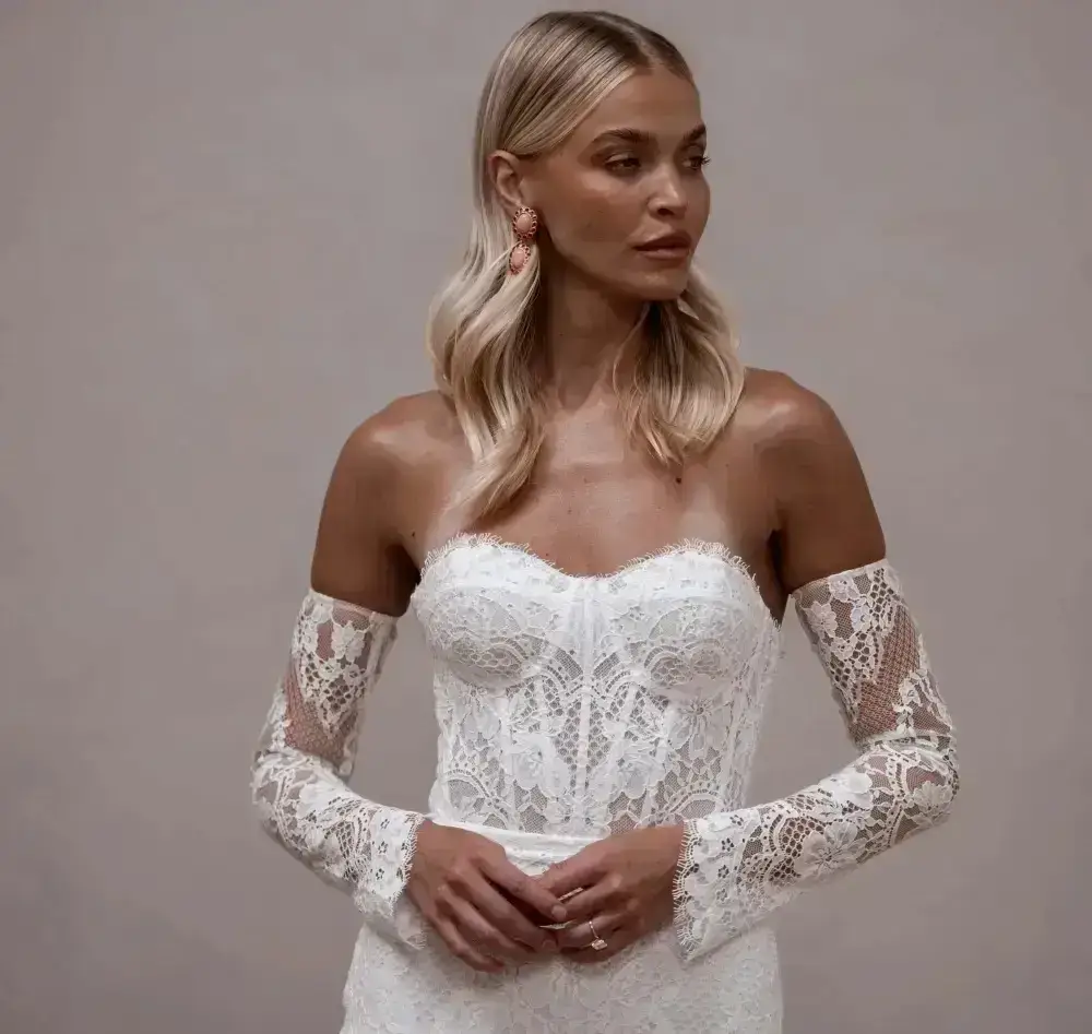 Model wearing a strapless bridal gown