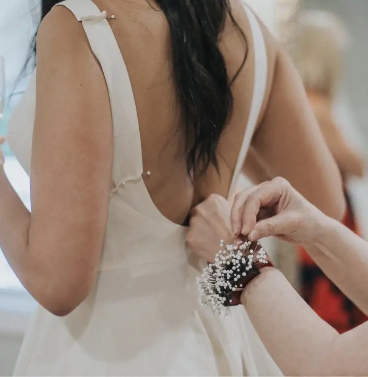 Back of wedding dress receiving dress repairs