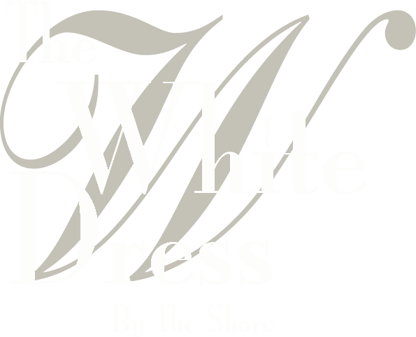 The White Dress by the Shore logo